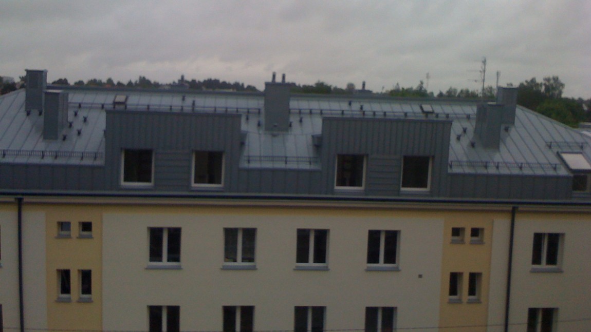 Production and assembly of steel roofs in blocks at Cavalry street in Bialystok